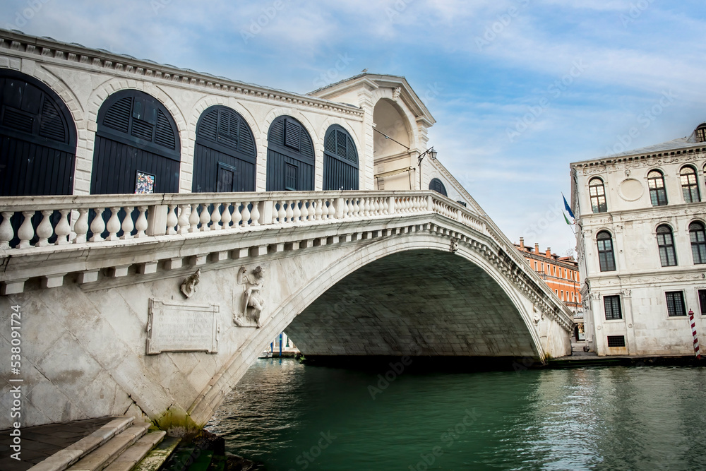 Rialto bridge across the Grand Canal Venice