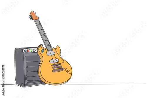 One single line drawing of electric guitar with amplifier. Stringed music instruments concept. Trendy continuous line draw graphic design vector illustration