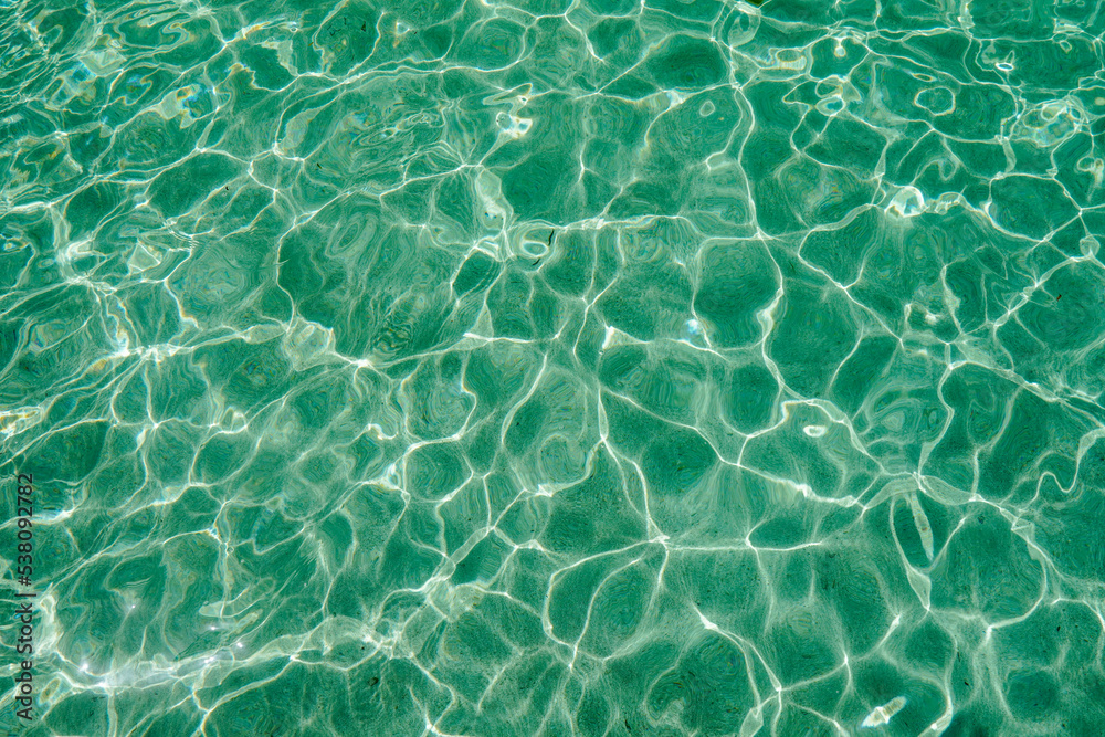 Obraz premium Blue clear water sea ocean. Sandy bottom. Sun lights. High quality photo