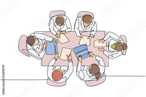 Single continuous single line drawing team of doctors held a conference at meeting room to discuss the hospital work programs, top view. Medical care concept one line draw design vector illustration