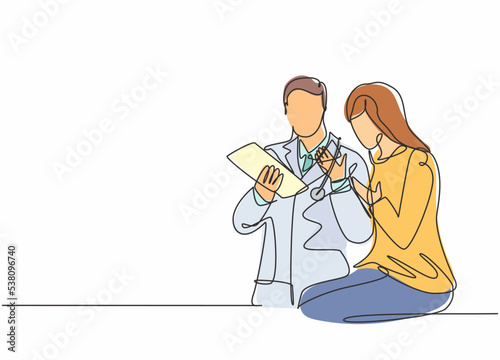 One single line drawing of young male doctor giving a consultation session to female patient while reading medical record. Medical health care concept continuous line draw design vector illustration