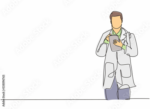 Single continuous line drawing of young male doctor thinking right medicine to the patient while holding tablet. Medical health care service workers concept one line draw design vector illustration