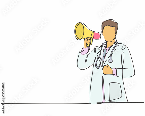 Single continuous line drawing of young male doctor pointing finger to something and holding megaphone loudspeaker at hospital. Medical health workers concept one line draw design vector illustration