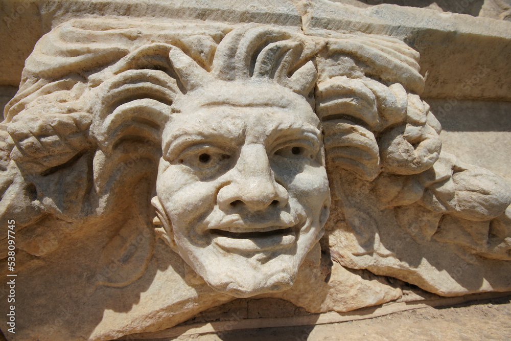 Ancient Mask Relief in Aphrodisias Ancient City in Aydin, Turkiye Ancient Mask Relief in Aphrodisias Ancient City in Aydin, Turkiye