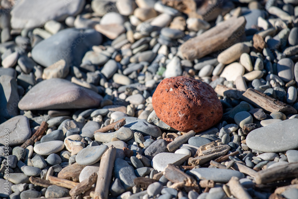 Pyramid of stones on a pebble sea beach. Pyramid of stones on a pebble sea beach.