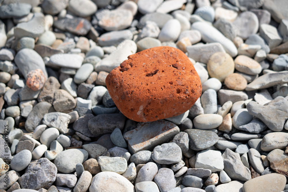 Pyramid of stones on a pebble sea beach. Pyramid of stones on a pebble sea beach.