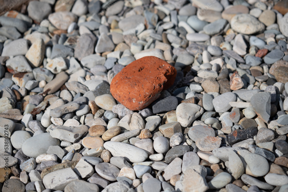 Pyramid of stones on a pebble sea beach. Pyramid of stones on a pebble sea beach.