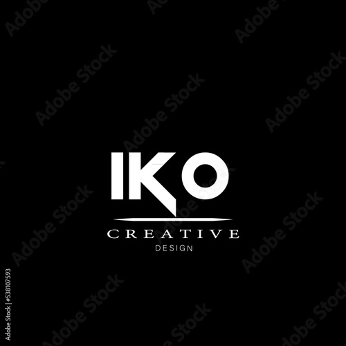 IKO letter logo. IKO modern alphabet font overlap style vector logo.  IKO contemporary lettering is on a black background. Contemporary, straightforward letter logo photo