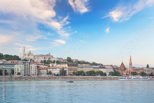 A stark view of the Fishermen's Bastion, the Church of St. Matthias, the Calvinist Church on the Danube Embankment in Budapest, Hungary © marinadatsenko
