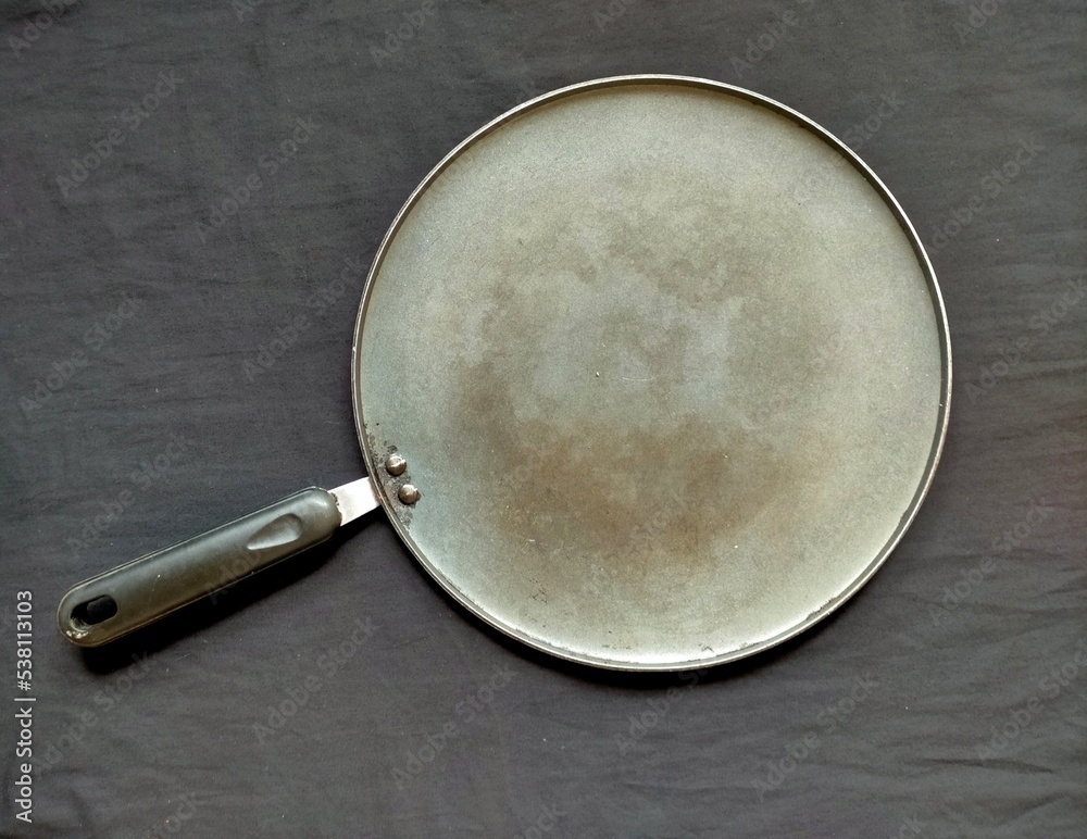 Fototapeta premium Frying pan on black background