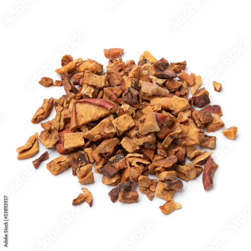 Heap of dried apple pieces close up to make apple tea isolated on white background