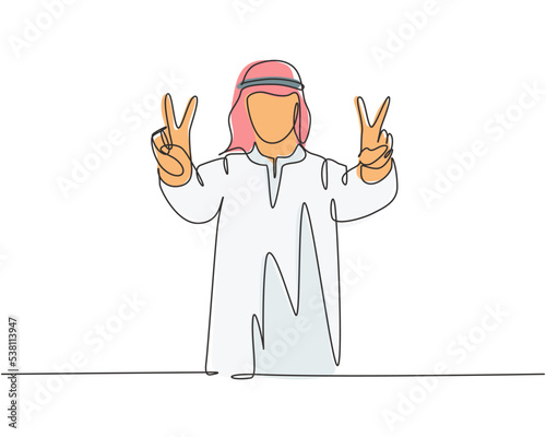 One continuous line drawing of young male muslim employee giving peace or victory hand gesture. Islamic clothing shemag, kandura, scarf, keffiyeh. Single line draw design vector illustration