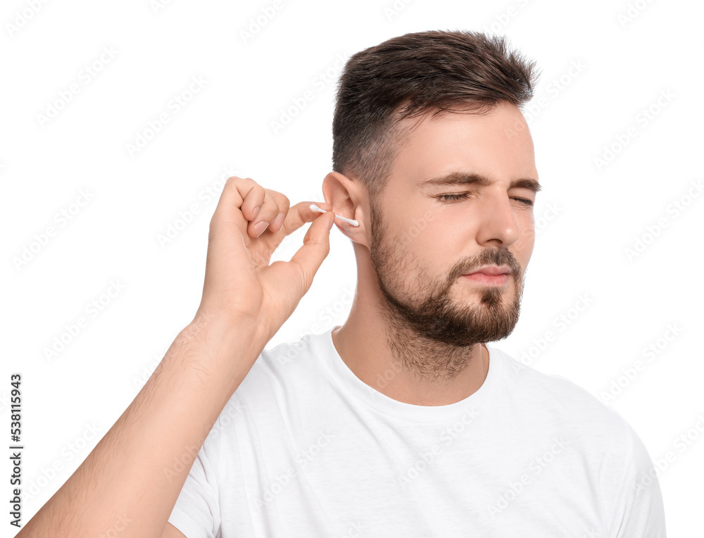 Young man cleaning ear with cotton swab on white background Young man cleaning ear with cotton swab on white background