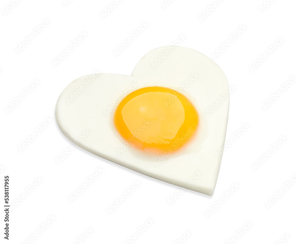 Tasty fried egg in shape of heart isolated on white Tasty fried egg in shape of heart isolated on white