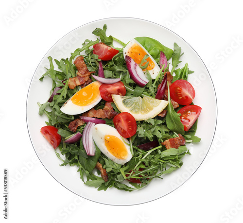 Delicious salad with boiled eggs, vegetables and bacon isolated on white, top view