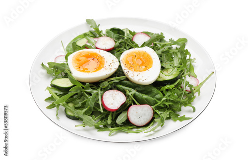 Delicious salad with boiled egg, vegetables and arugula isolated on white