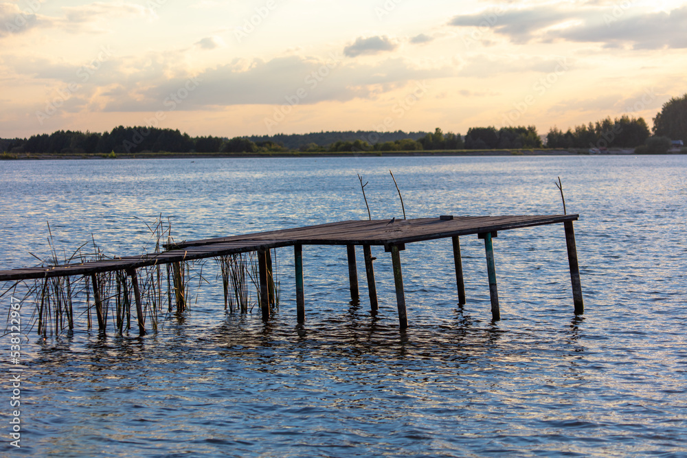 Wooden bridge leading to the lake.