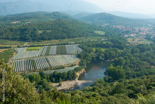 Obraz na płótnie View of a beautiful mountain landscape, fields and a river in the Pyrenees w salonie