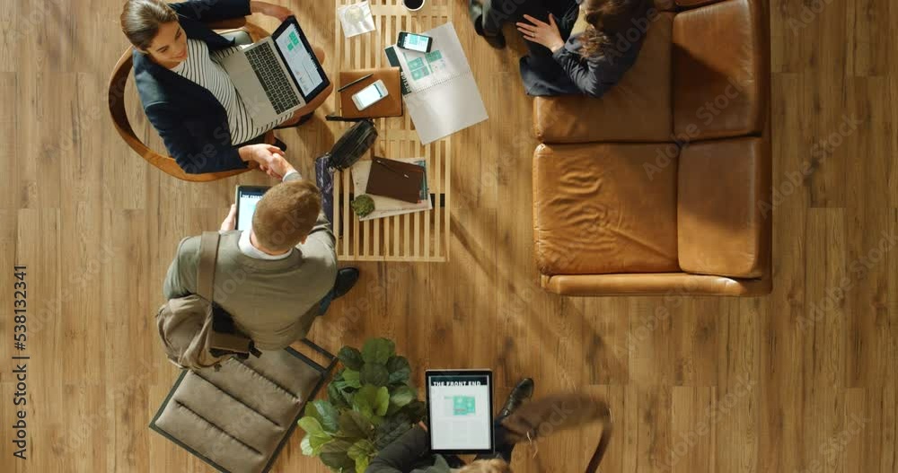 Startup company, business people and team in meeting for marketing, advertising and proposal for development strategy. Top view, collaboration and corporate group talking and working using technology