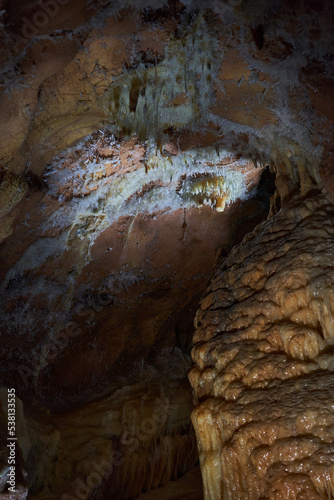 Crystals on speleothemes in a cave