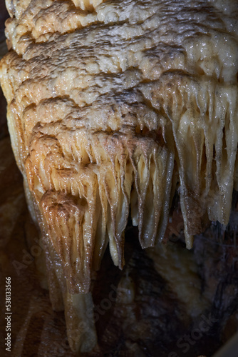 Crystals on speleothemes in a cave photo