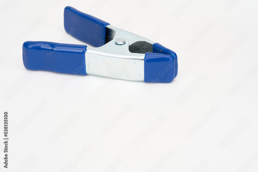 closeup of A clamp isolated on white closeup of A clamp isolated on white