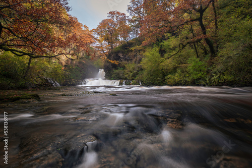 Autumnal waterfall along the Four Waterfalls walk  Waterfall Country  Brecon Beacons national park  South Wales  the United Kingdom