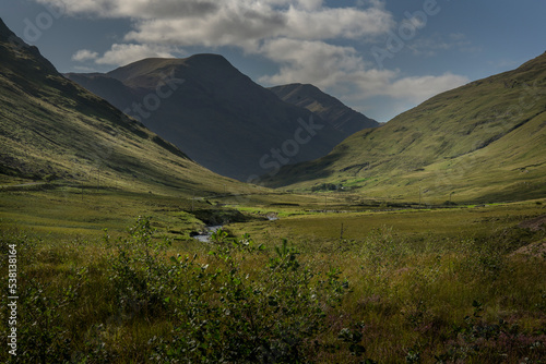 Remote beauty as you drive through the Sheeffry Pass from Liscarny to Doolough where the Glenummera River meanders between the Sheeffry Hills photo