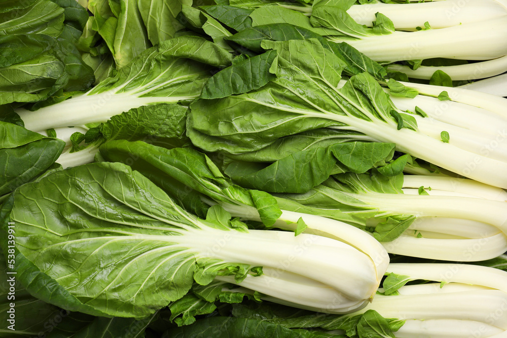 Fresh green pak choy cabbages as background, top view Fresh green pak choy cabbages as background, top view