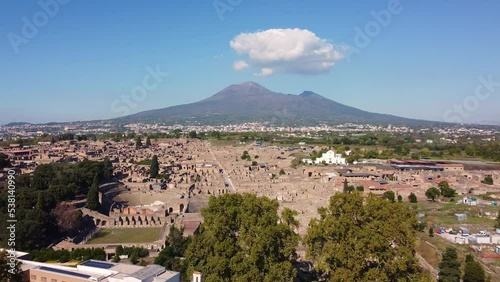 Pompei, Itay: Aerial drone footage of the famous Pompeii archaeological old city by the Vesuve volcano in Napoly, or Naples, in Italy on a sunny day.  photo