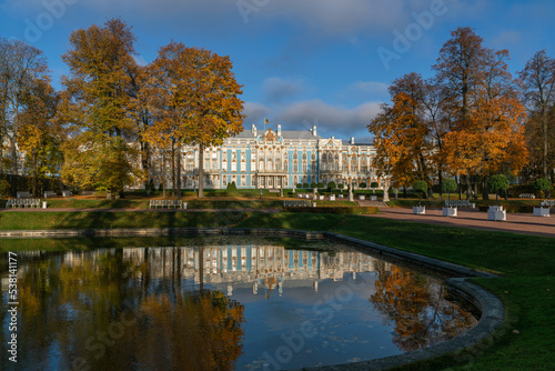 View of the Catherine Palace with a reflection in the Mirror Pond of the Catherine Park in Tsarskoye Selo on a sunny autumn day, Pushkin, Saint Petersburg, Russia