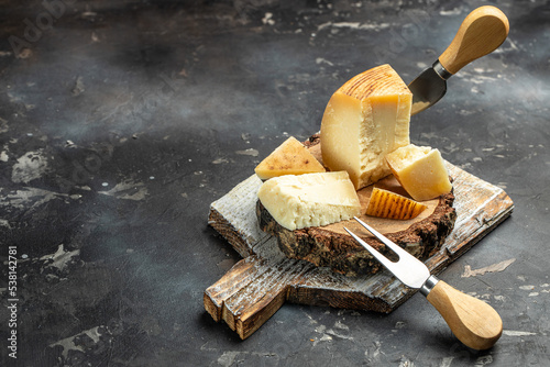 Gruyere is classified as a Swiss-type or Alpine cheese, and is sweet but slightly salty, with a flavor that varies widely with age, place for text photo