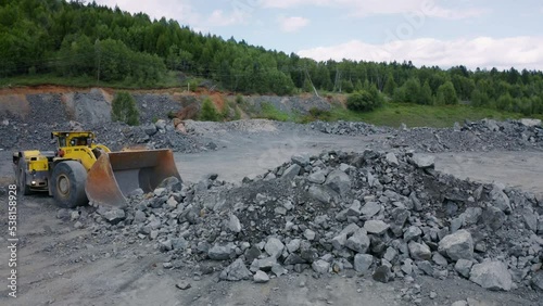 The underground loader sorts ore samples while working on the surface. photo