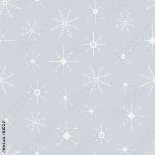 Seamless pattern of snowflakes. Hand drawn winter background. Doodle Christmas snowflakes vector print