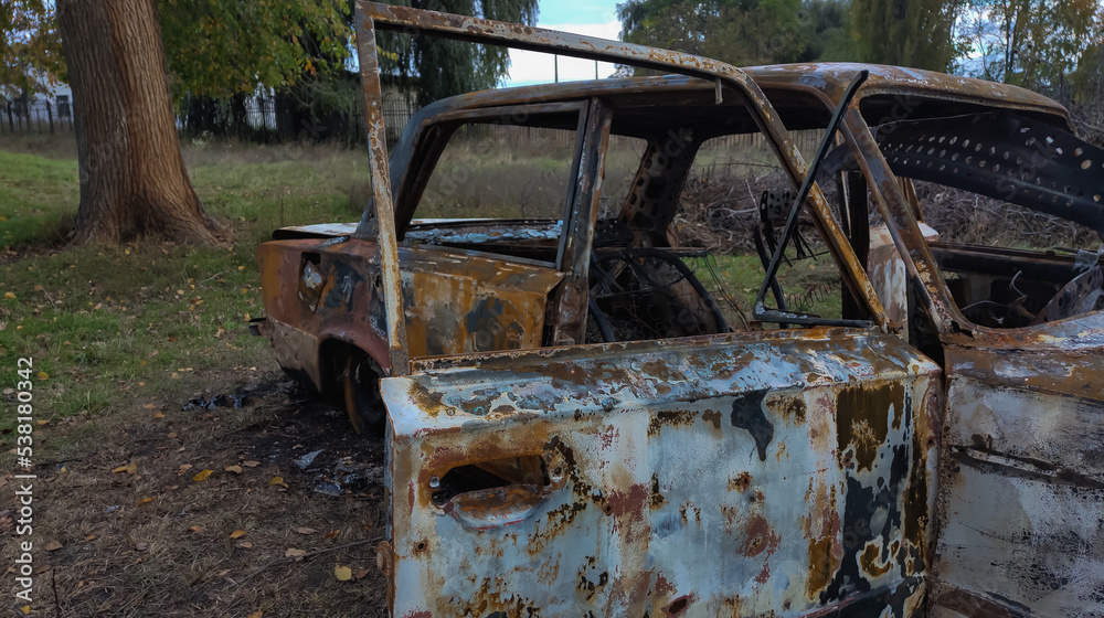Salon of a burned-out car. Burned automobile, car fire. Fire damage motr vehicle Salon of a burned-out car. Burned automobile, car fire. Fire damage motr vehicle