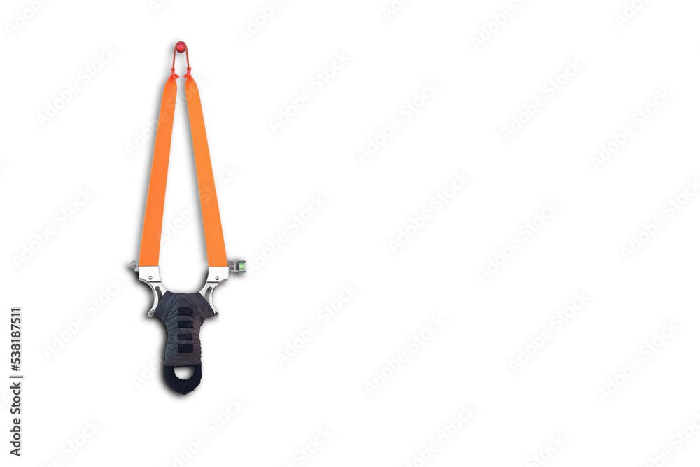sports slingshot, hunting slingshot hanging on the wall, isolate on white background sports slingshot, hunting slingshot hanging on the wall, isolate on white background