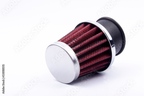 Conical chrome air filter with  - tuning accessory on a white background