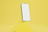 presentation of the smartphone. smartphone balancing on a yellow cube on a yellow background. copy paste. 3D render
