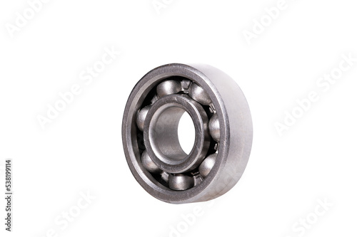 A rolling bearing used in home workshop equipment on an isolated background. photo