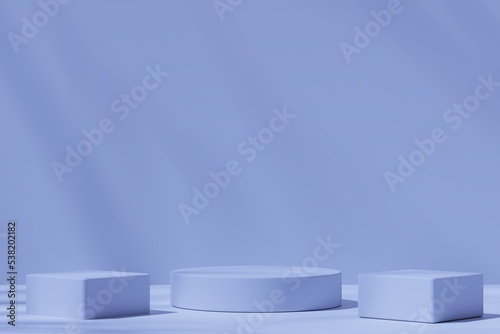 Three round and square podiums on a blue background with shadows  3d render