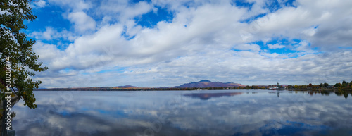 Magnificent autumn landscapes near a lake in the Canadian forest in the province of Quebec