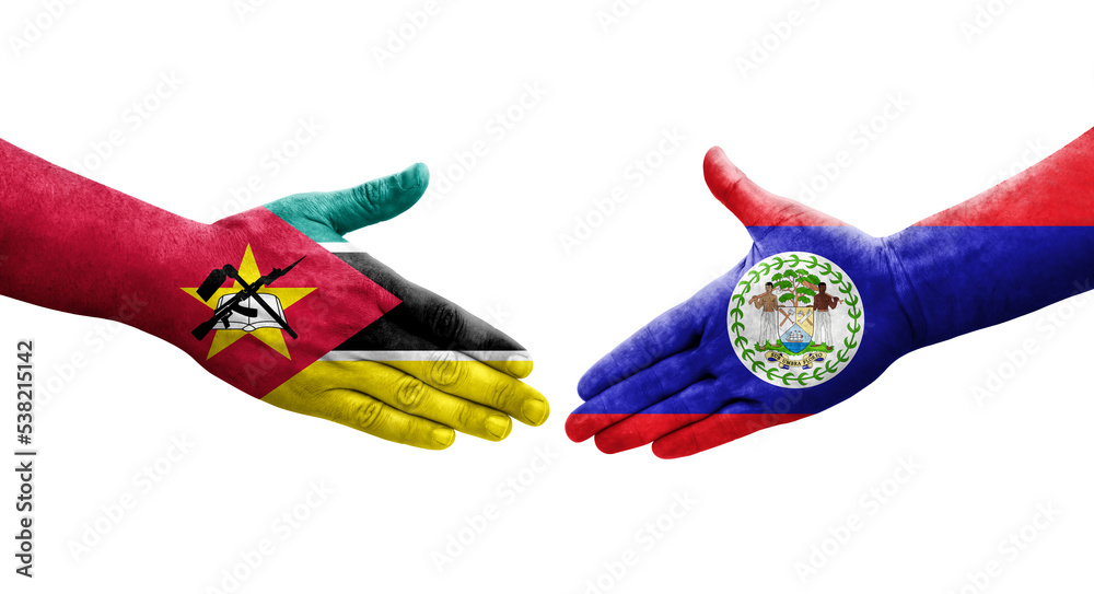 Handshake between Belize and Mozambique flags painted on hands, isolated transparent image.