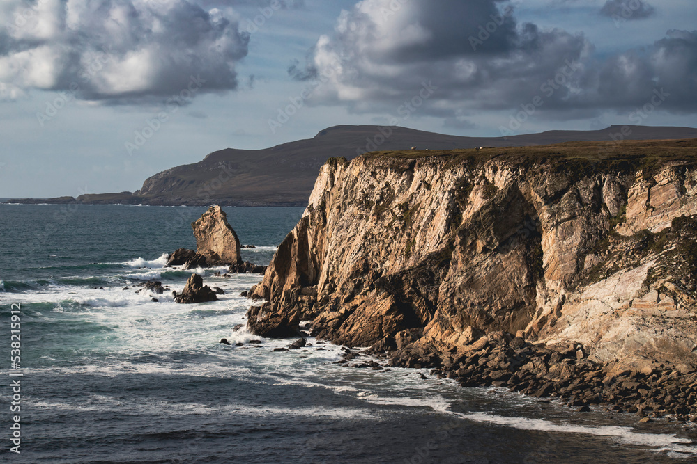 Cliffs and mountain on irish coast, county Mayo, Irish nature landscape.