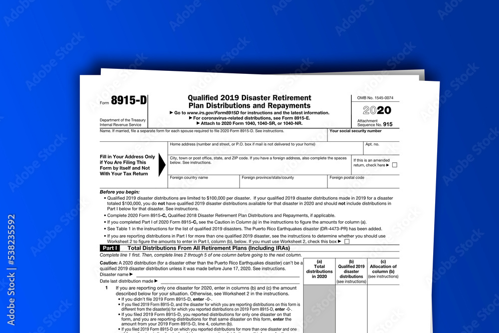 Fototapeta premium Form 8915-D documentation published IRS USA 44199. American tax document on colored