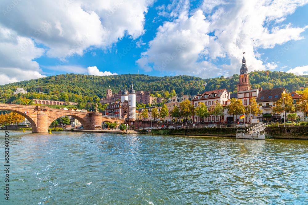 Fototapeta premium The Karl Theodor Bridge, commonly knows as the Old Bridge, and the Bridge Gate along the Neckar River in the Bavarian city of Heidelberg. 