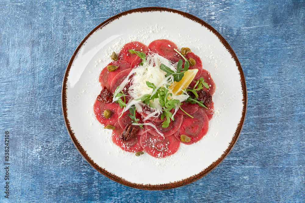 beef carpaccio with lemon and parmesan beef carpaccio with lemon and parmesan