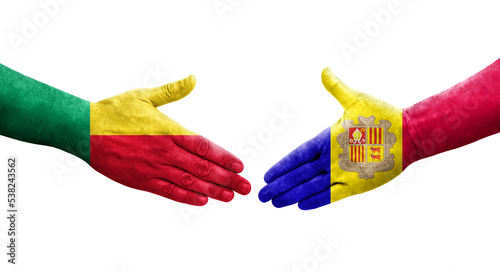 Handshake between Benin and Andorra flags painted on hands, isolated transparent image.