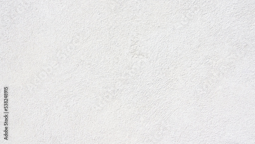 Textured background. Decorative plaster walls, external decoration of facade. Texture of white