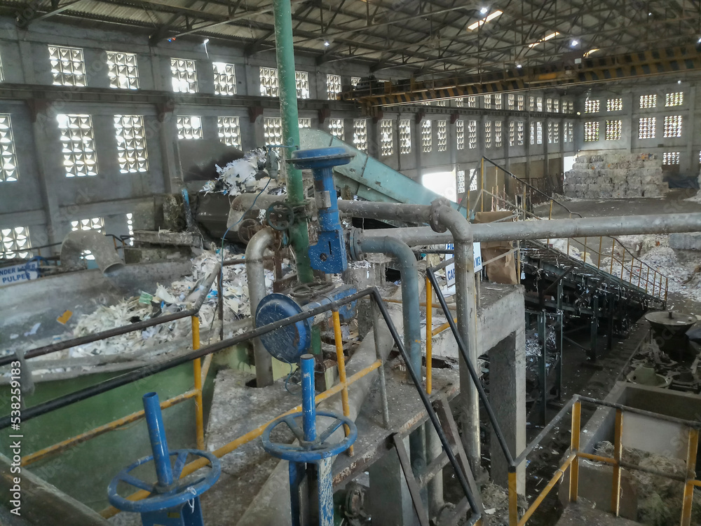 Dandeli, Karnataka, India - 16th May 2019 : Pulper or pulping machine inside paper manufacturing plant. Paper pulp is being extracted from used papers for making fresh paper, saving environment.