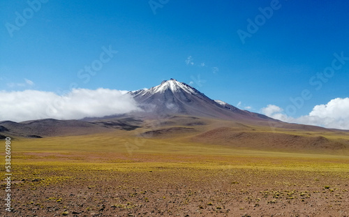 Majestic Snow-Capped Volcano in the Atacama Desert photo